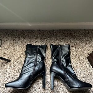 Elegant Black Leather Heeled Boots